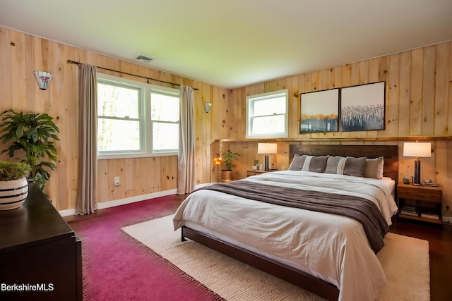 232 Harrington Rd, Otis, MA 01253 - bedroom with wood walls and baseboards