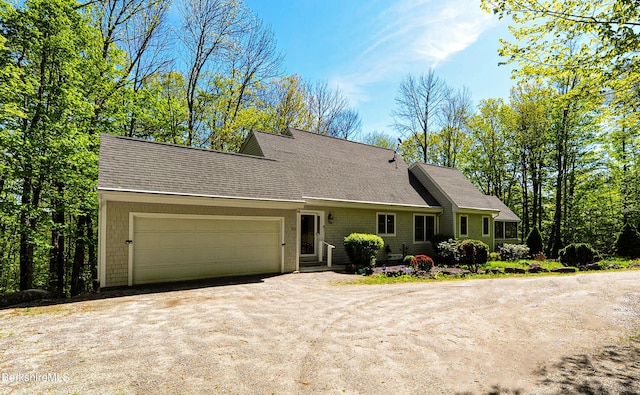 232 Harrington Rd, Otis, MA 01253 - view of front of property featuring driveway, an attached garage, and roof with shingles