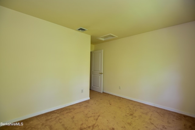 232 Harrington Rd, Otis, MA 01253 - spare room with light colored carpet, baseboards, and attic access