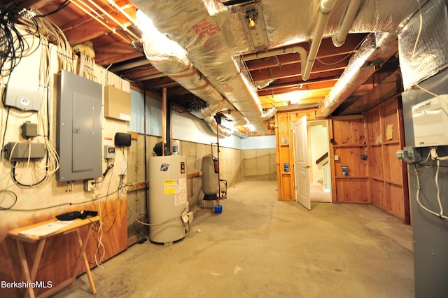 232 Harrington Rd, Otis, MA 01253 - unfinished basement featuring water heater and electric panel