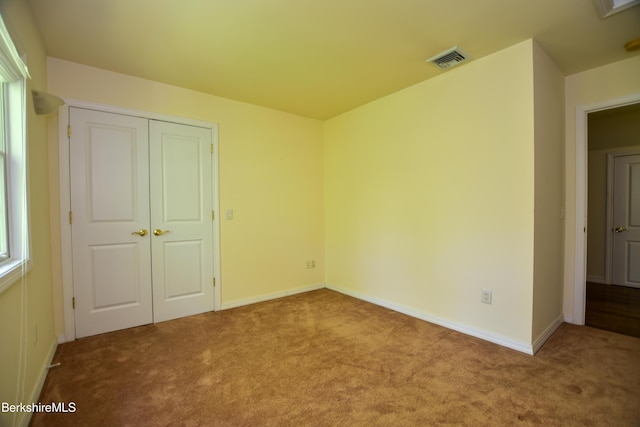 232 Harrington Rd, Otis, MA 01253 - unfurnished bedroom featuring carpet, a closet, and baseboards