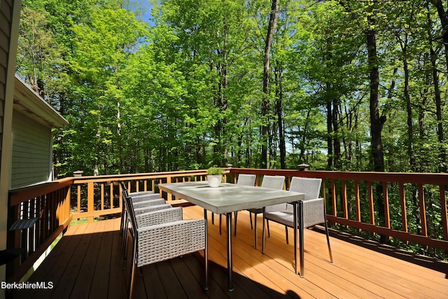 232 Harrington Rd, Otis, MA 01253 - wooden deck with outdoor dining area