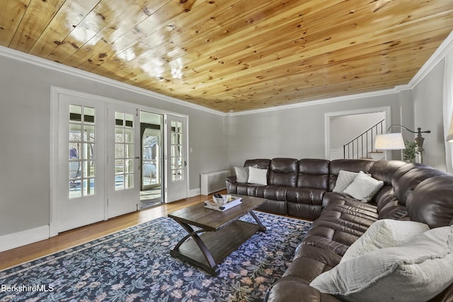 living room featuring stairs, wood finished floors, ornamental molding, and wooden ceiling