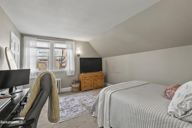 carpeted bedroom featuring baseboards, lofted ceiling, and radiator