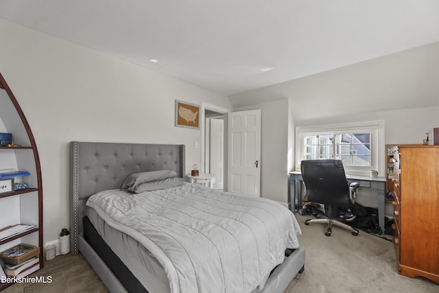 bedroom with light carpet