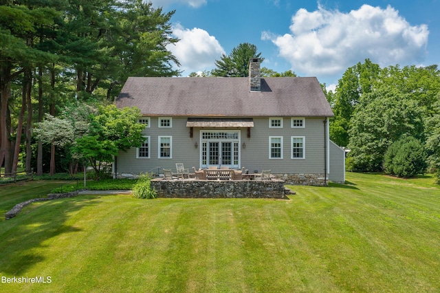 25 Sheffield Rd, Egremont, MA 01230 - back of house featuring a yard, a patio, a chimney, and a shingled roof