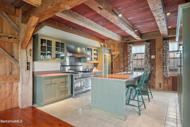 25 Sheffield Rd, Egremont, MA 01230 - kitchen featuring extractor fan, a wooden ceiling with exposed beams, green cabinetry, double oven range, and wood walls