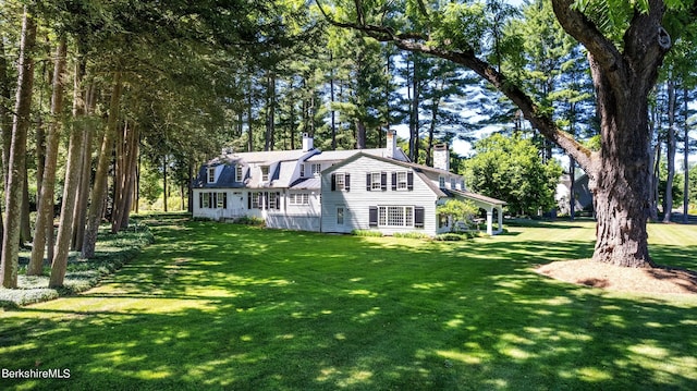 25 Sheffield Rd, Egremont, MA 01230 - view of front of property with a chimney, a gambrel roof, and a front yard