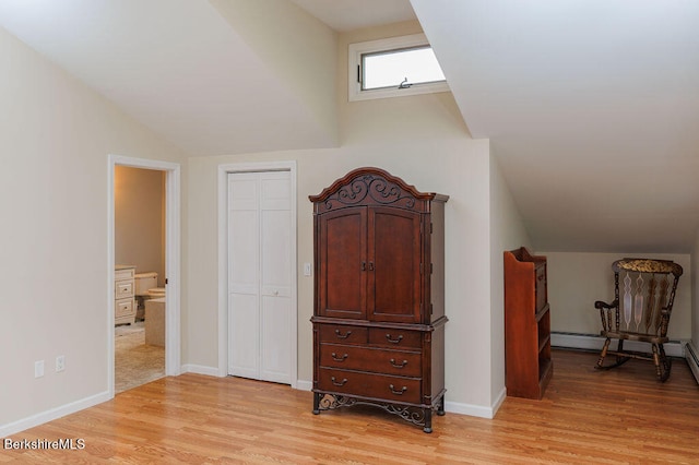 45 State Line Rd, West Stockbridge, MA 01266 - bedroom with light wood-style flooring, baseboards, vaulted ceiling, and ensuite bathroom