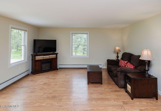 45 State Line Rd, West Stockbridge, MA 01266 - living area with baseboard heating, light wood-style floors, and a fireplace