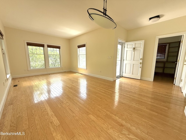2 Copper Beech Ln, Great Barrington, MA 01230 - unfurnished living room featuring light wood-style flooring and baseboards