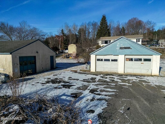 view of snow covered garage