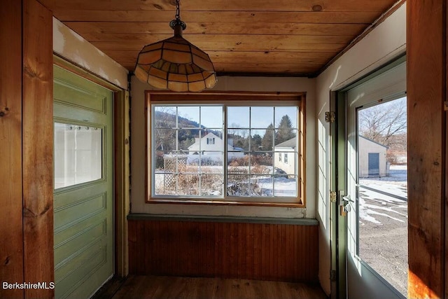 interior space with plenty of natural light and wooden ceiling