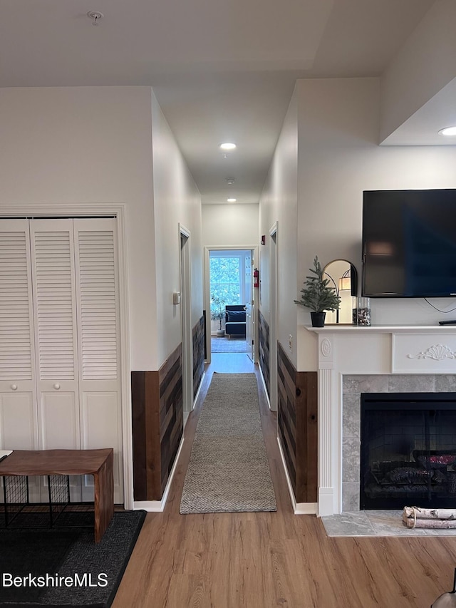 corridor featuring hardwood / wood-style floors