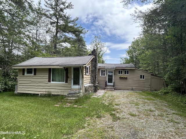 369 Pine Rd, Otis, MA 01253 - view of front of house with a chimney, entry steps, and roof with shingles