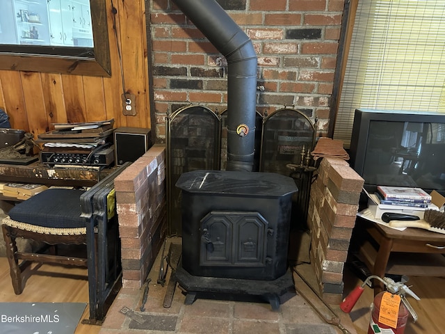 369 Pine Rd, Otis, MA 01253 - detailed view of a wood stove and brick wall