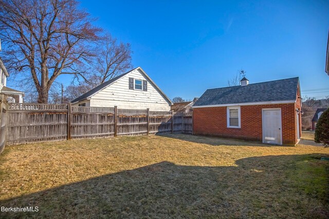 view of yard with a fenced backyard