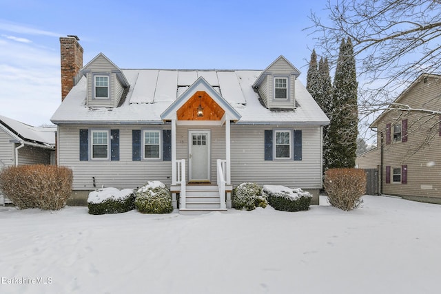 view of new england style home