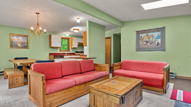 15 Elk Dr, Lee, MA 01238 - living room with light carpet, a chandelier, a baseboard radiator, beamed ceiling, and baseboards