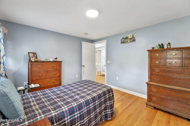 bedroom with light hardwood / wood-style flooring