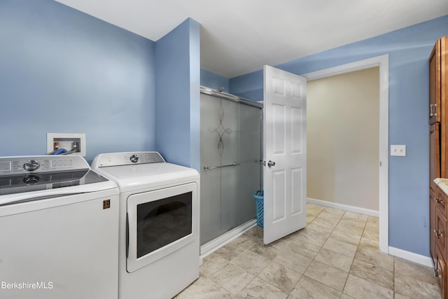 laundry area with washer and dryer