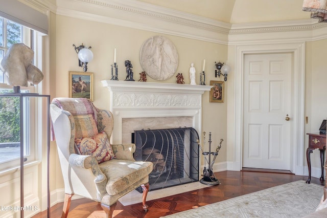 living room with dark parquet flooring and vaulted ceiling