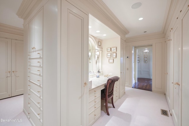 bathroom with ornamental molding