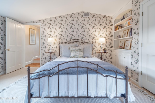 bedroom with vaulted ceiling