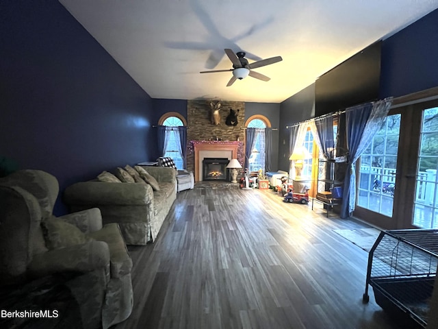 living room with hardwood / wood-style floors and ceiling fan