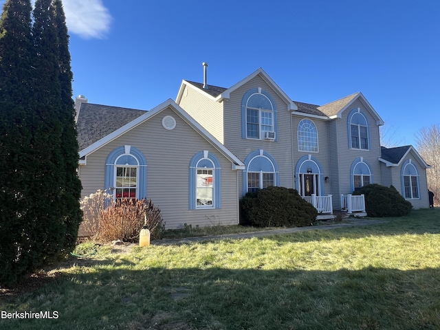 view of front of house with a front lawn