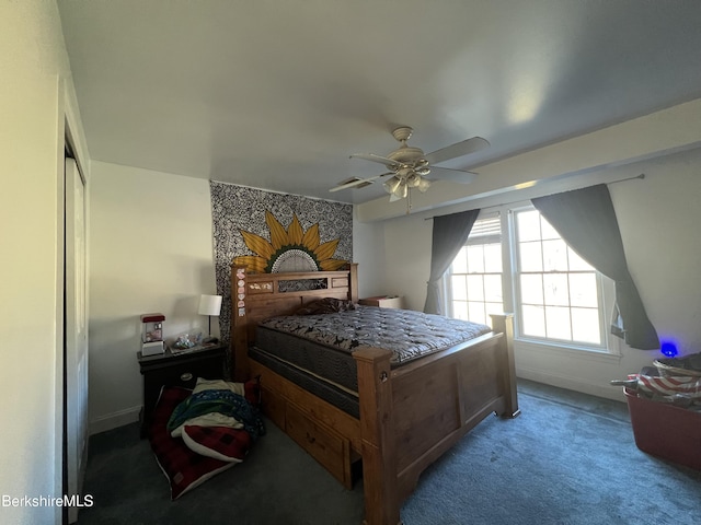 bedroom featuring carpet, a closet, and ceiling fan