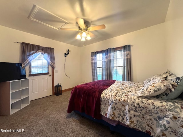 bedroom with ceiling fan and carpet floors