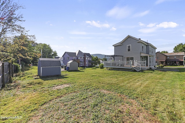 450 E Main St, North Adams, MA 01247 - view of yard featuring a storage shed and a wooden deck