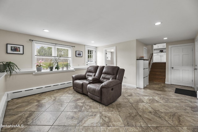 living area featuring stairs, recessed lighting, baseboards, and a baseboard radiator