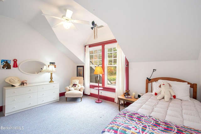 bedroom with carpet flooring, ceiling fan, and vaulted ceiling