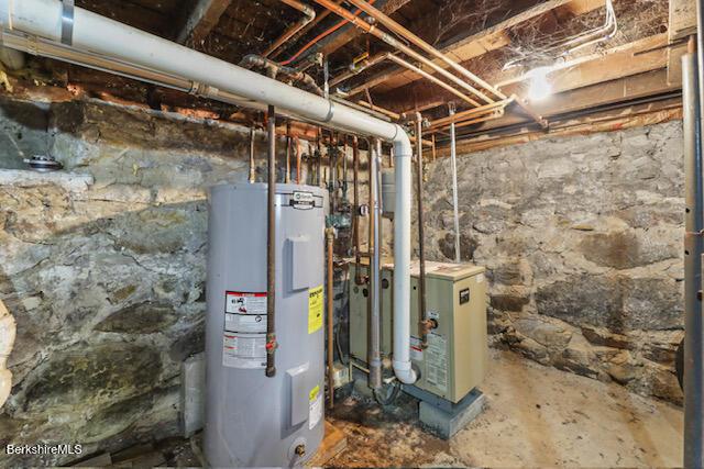 utility room with electric water heater