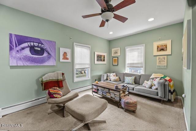 living room featuring a baseboard heating unit, carpet flooring, recessed lighting, a ceiling fan, and a baseboard radiator