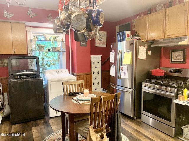 kitchen featuring separate washer and dryer, hardwood / wood-style flooring, stainless steel appliances, and light brown cabinets