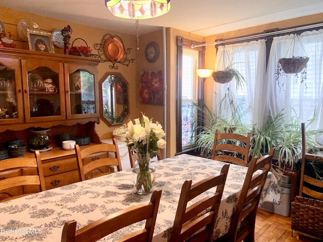 dining area with light parquet flooring