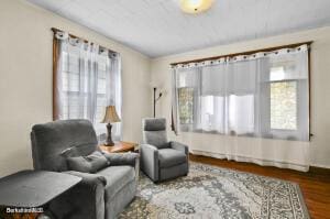 sitting room featuring wood finished floors