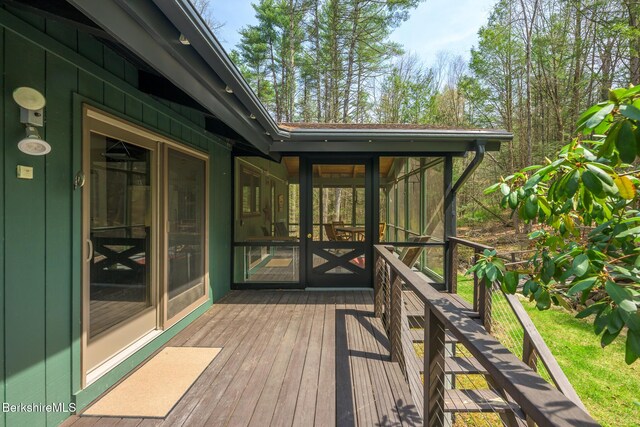 812 Canaan Southfield Rd, New Marlborough, MA 01259 - wooden terrace with a sunroom