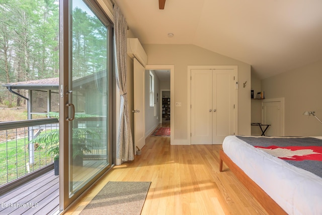 812 Canaan Southfield Rd, New Marlborough, MA 01259 - bedroom with light wood-type flooring, lofted ceiling, multiple windows, and a closet