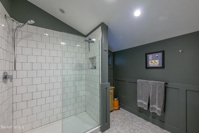 812 Canaan Southfield Rd, New Marlborough, MA 01259 - full bath with lofted ceiling, a tile shower, a decorative wall, and a wainscoted wall