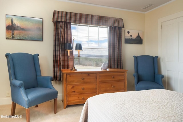 carpeted bedroom with crown molding