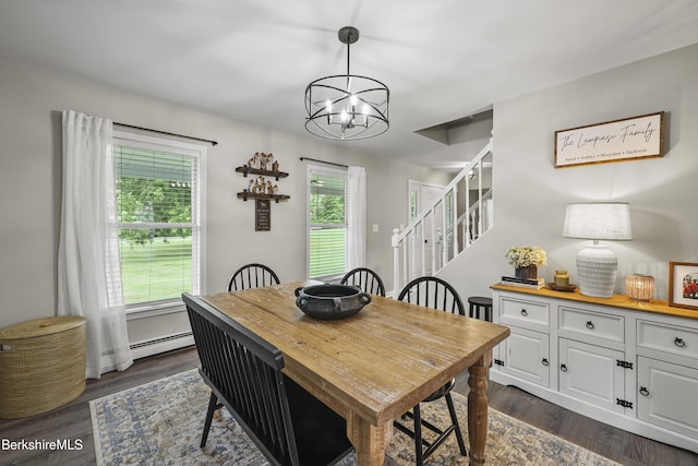 679 Middle Pownal Rd, Pownal, VT 05261 - dining space with a chandelier, dark wood-type flooring, stairs, and a baseboard heating unit