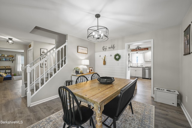 679 Middle Pownal Rd, Pownal, VT 05261 - dining area with stairway, wood finished floors, and a chandelier