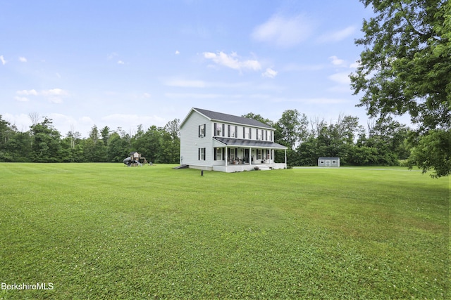 679 Middle Pownal Rd, Pownal, VT 05261 - view of front of home with a front lawn, an outdoor structure, and view of wooded area