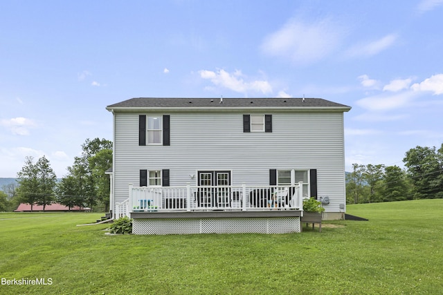 679 Middle Pownal Rd, Pownal, VT 05261 - rear view of house featuring a deck and a lawn