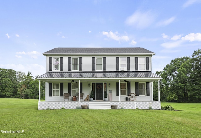 679 Middle Pownal Rd, Pownal, VT 05261 - colonial house featuring a ceiling fan, a porch, a front yard, and a metal roof