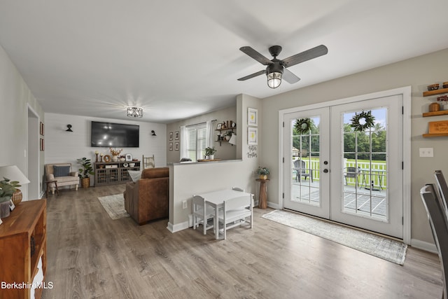 679 Middle Pownal Rd, Pownal, VT 05261 - living room with french doors, wood finished floors, and ceiling fan